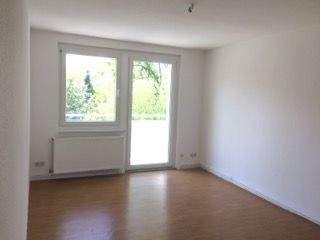 Wohnzimmer mit Balkon