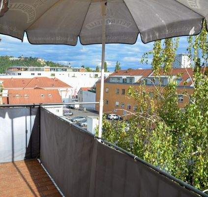 Balkon mit Schloßbergblick