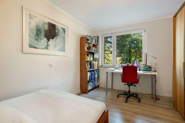 Schlafzimmer mit Schreibtisch