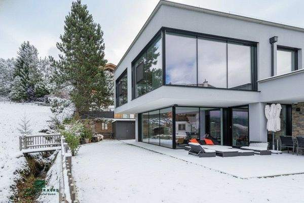 Neubau Ski amadé, am Grünland mit Panoramablick auf die Alpen