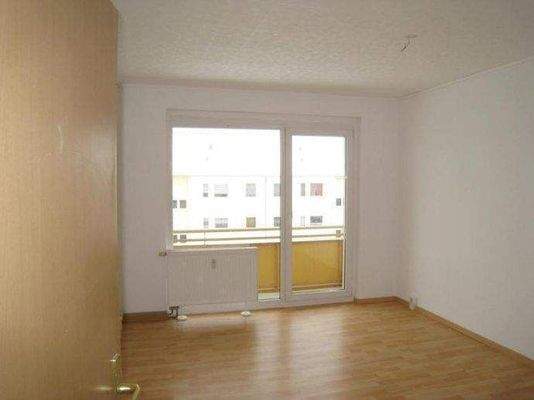 Wohnzimmer mit Balkon