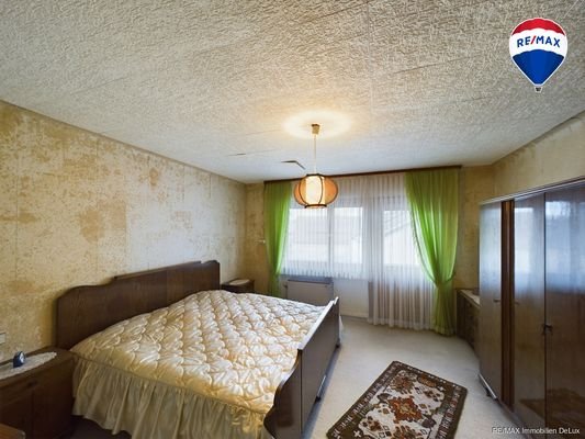 RE/MAX Immobilien DeLux 1. Schlafzimmer OG