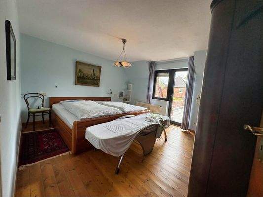 Schlafzimmer mit Balkon