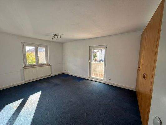 Schlafzimmer mit Balkon