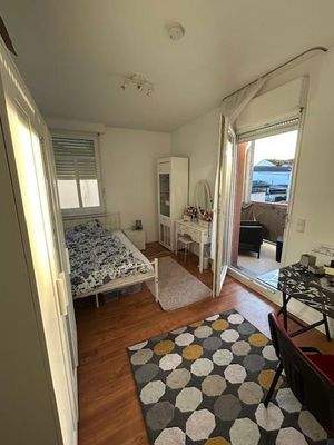 Schlafzimmer mit Balkon