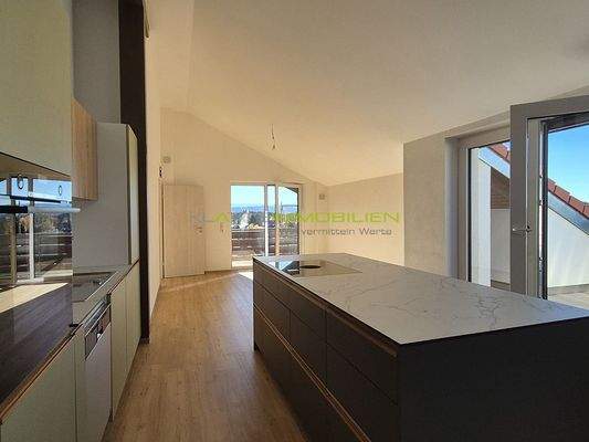 DG Wohn-Essküche 06 mit Zugang zum Südbalkon