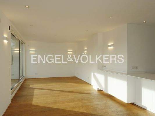 Wohnzimmer mit direktem Zugang zur Dachterrasse