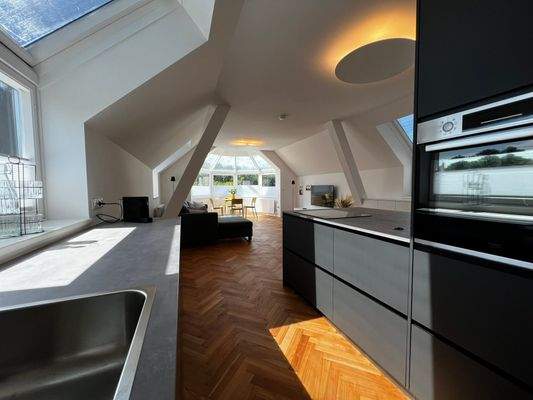 Blick ins Penthouse Top 1 / Wohnküche-Lounge