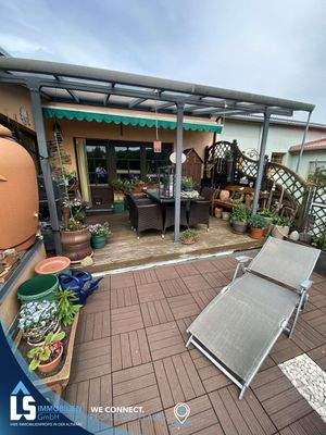 Überdachte Terrasse Wohnung