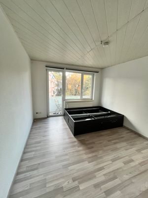 Wohnzimmer mit Balkon