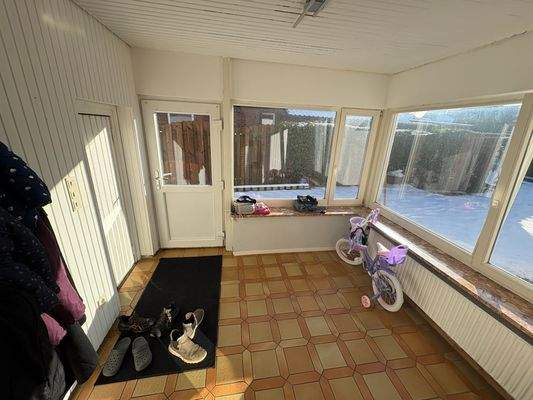 Eingang mit Zugang Garage, Whg. EG