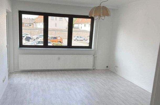 Wohnzimmer mit Ausgang auf den Balkon