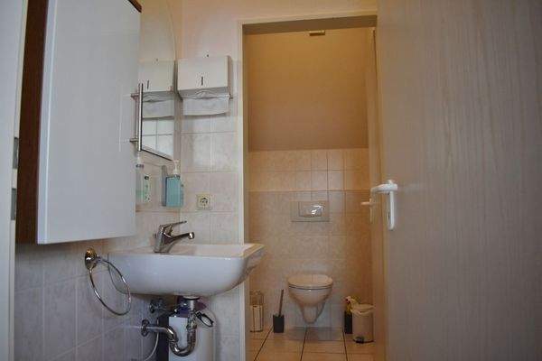 WC in der Ladenfläche