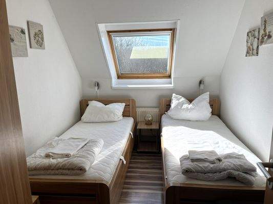 1.OG_FeWo1 Schlafzimmer