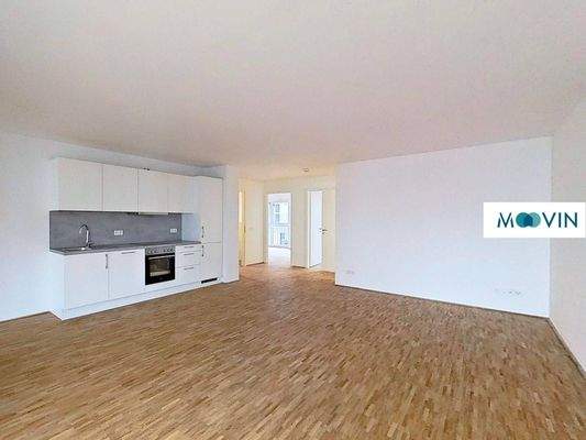 Ansicht III: Wohn- und Esszimmer mit offenem Küchenbereich