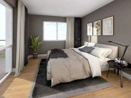 Schlafzimmer 1 mit zwei Fenstern