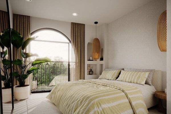 Gemütliches Schlafzimmer mit großzügigem Fensterelement