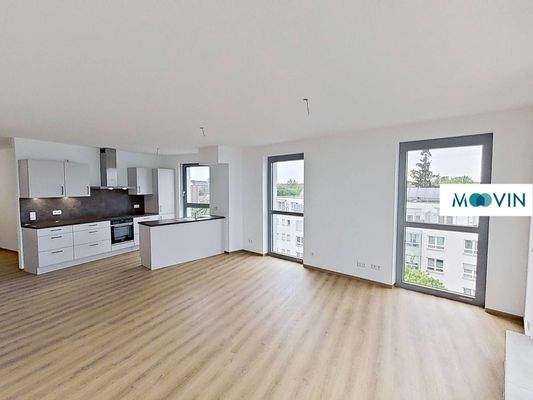 Ansicht III: Wohn- und Esszimmer mit offenem Küchenbereich