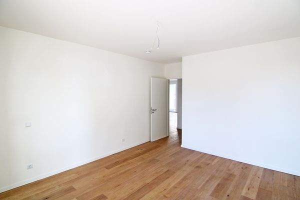 Blick in das erste Schlafzimmer