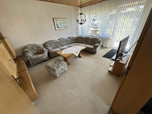 Wohnzimmer mit Balkon