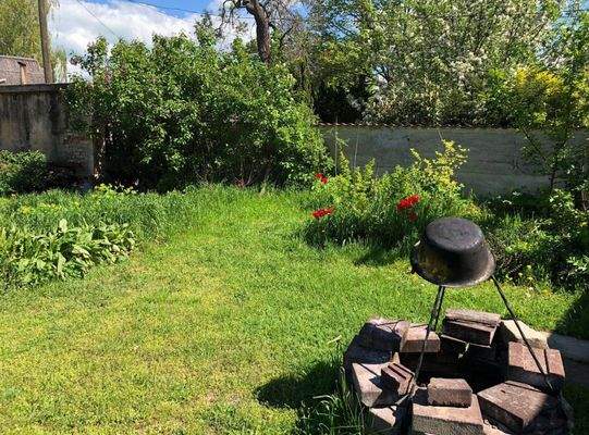 Garten mit Feuerstelle