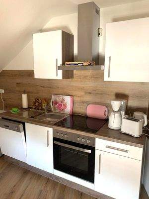 Küchenbereich mit Einbauküche