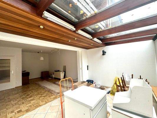 Wohnzimmer und Wintergarten.jpeg