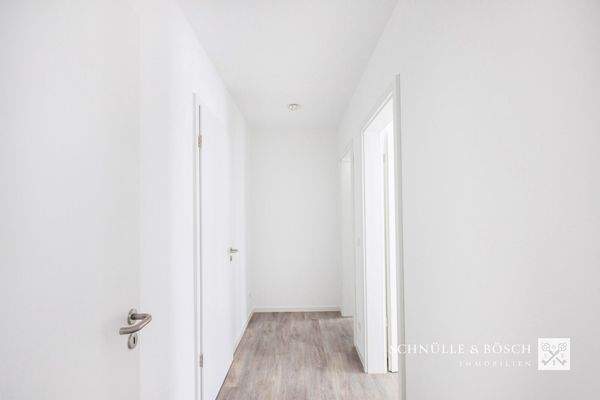 Der Flur zu den weiteren Zimmern