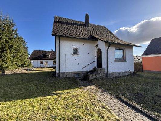 Wohnhaus und Grundstück