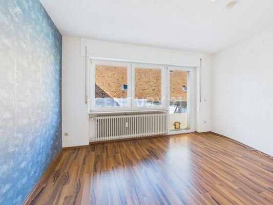 Schlafzimmer mit Balkonzugang