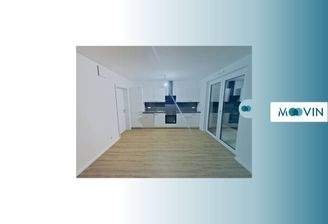 Ansicht I: Wohn- und Esszimmer  mit offenem Küchenbereich