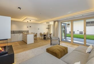 KITZIMMO-Luxuriöse Gartenwohnung mit eigenem Wellnessbereich - Immobilien Brixen.