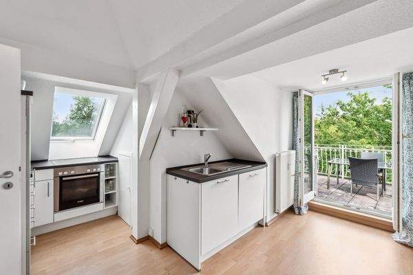 Balkon und Küche im Dachgeschoss