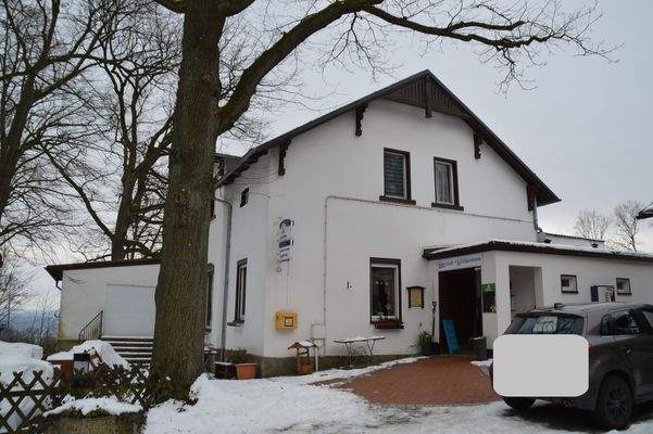 Gaststätte Seitenansicht mit Eingangsbereich