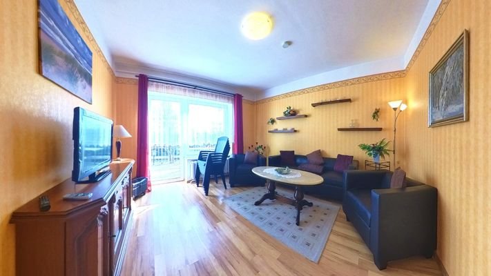 Wohnzimmer mit Zugang zur Dachterrasse WE 3 im Obergeschoss