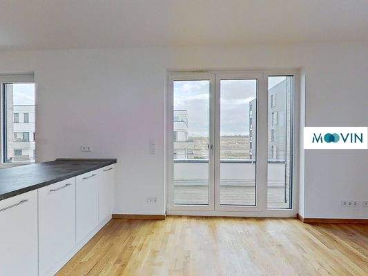 Ansicht IV: Wohn- und Esszimmer mit offenem Küchenbereich