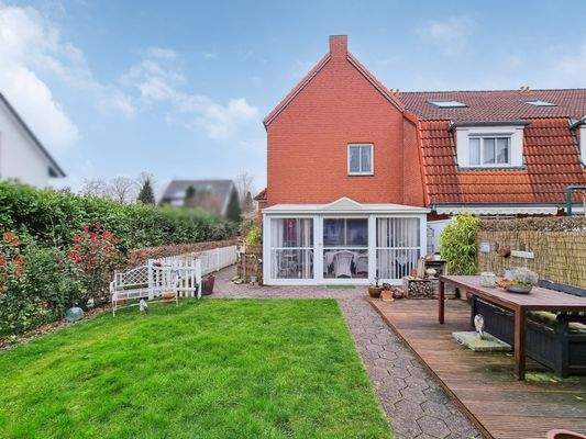 Haus Rückansicht mit einem Wintergarten