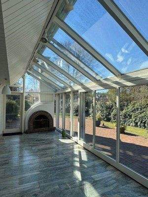 Wintergarten mit Kamin