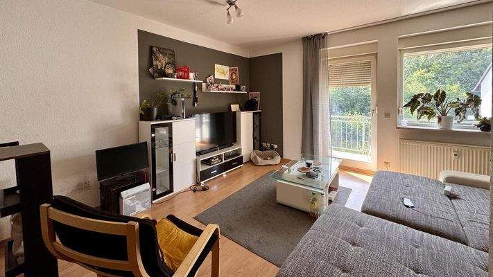 Wohnzimmer mit Balkon