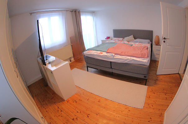 Schlafzimmer mit Balkon