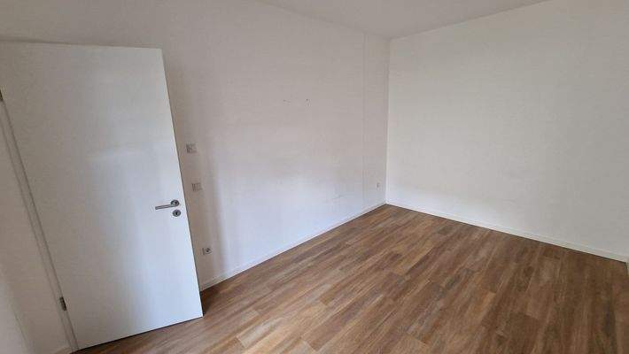 Leeres Zimmer mit Holzboden