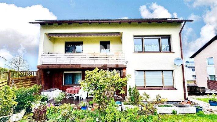 Rückansicht / Terrasse EG WE1