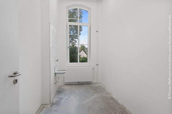 Abstellraum mit Wasseranschluss im 1. Obergeschoss.