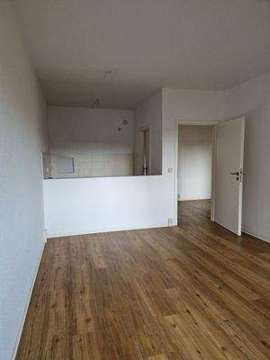 Wohnzimmer mit Küche