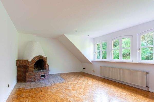 Wohnzimmer mit Kamin 