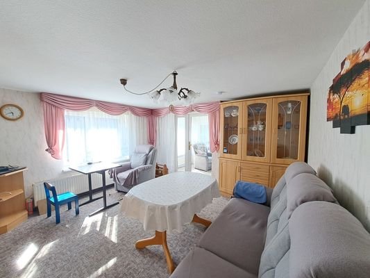 1. OG - Wohnzimmer mit Zugang Wintergarten
