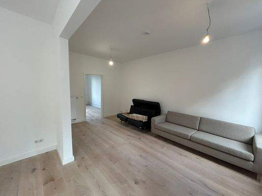 Wohnbereich mit Zugang zum Schlafzimmer