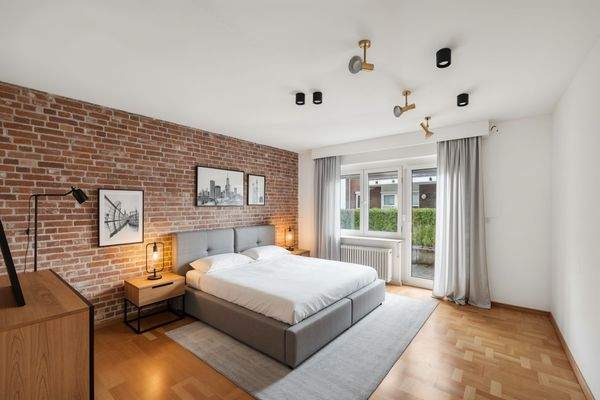 Schlafzimmer II | Vollbad en Suite-Staging - (KI generiert)