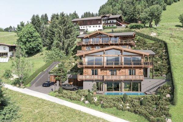KITZIMMO-Grundstück mit Baugenehmigung für 2 Luxuschalets - Immobilien Itter kaufen.