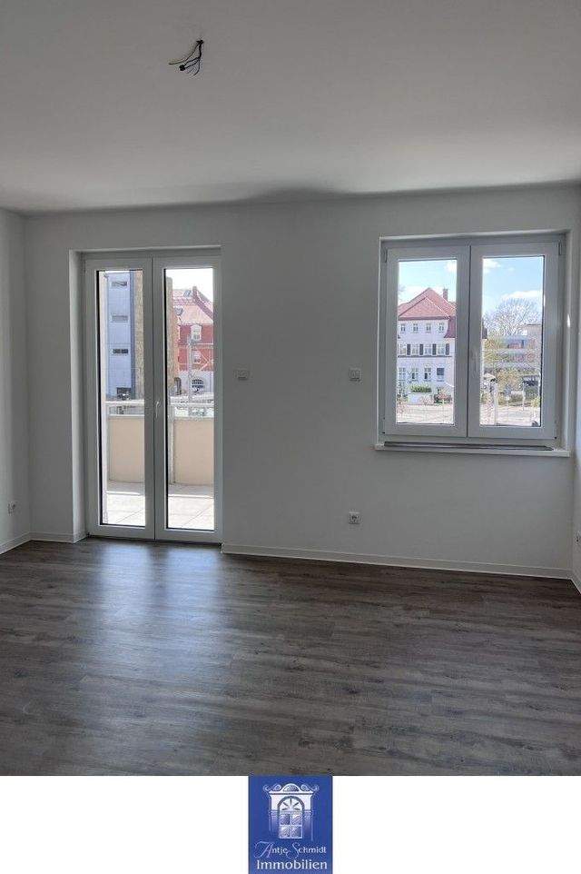 Modern ausgestattete Familienwohnung mit Balkon und Fußbodenheizung! - Foto 2